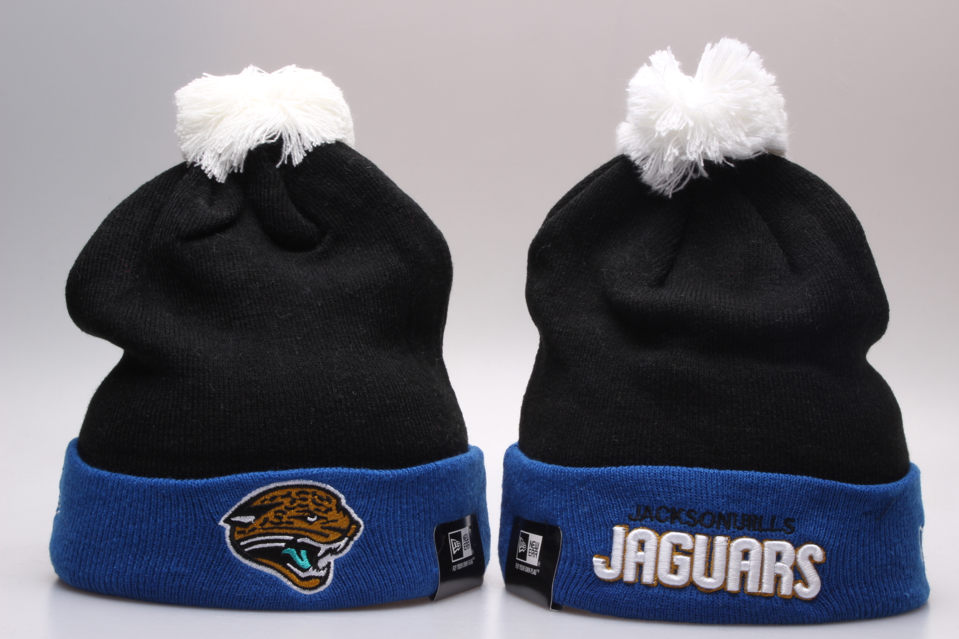 Jaguars Team Logo Black Navy Cuffed Pom Knit Hat YP